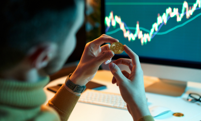 Investor looking at a bitcoin